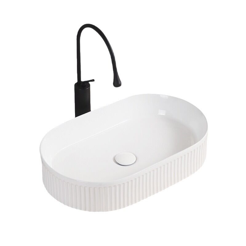Modern White Ceramic Art Oval Above Counter Basin Bathroom Sink Stripe Design Hand Wash Basins with Sanitary Drainer Modern White Ceramic Art Oval Above Modern White Ceramic Art Oval Above Counter Basin Bathroom Sink Stripe Design Hand Wash Basins with Sanitary Drainer